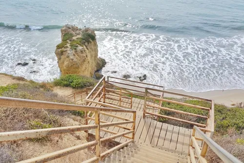 Image taken from https://www.flashpackingamerica.com/wp-content/uploads/2019/12/el-matador-state-beach-malibu-california-stairs-1-.jpeg