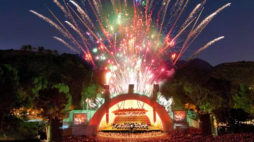 Image taken from https://media.nbclosangeles.com/2021/04/Hollywood-Bowl-shell-with-fireworks.-Photo-by-Adam-Latham-1.jpg?quality=85&amp;strip=all&amp;resize=1200,675