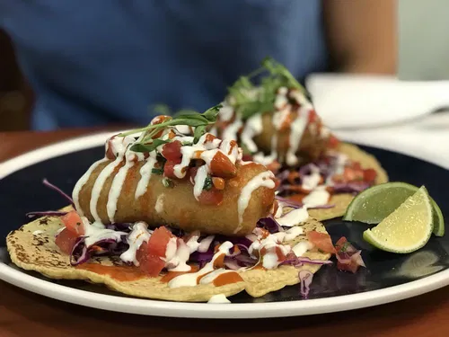 Image taken from https://s3-media3.fl.yelpcdn.com/bphoto/57ExRnTn-IZfTcTnaGOghw/o.jpg