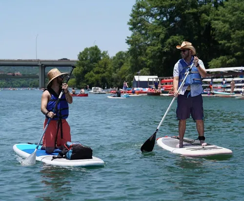 Image taken from https://cdn.shopify.com/s/files/1/0559/6944/7990/files/lady-bird-lake-paddle-boarding-irockerus-3.jpg?v=1711941713