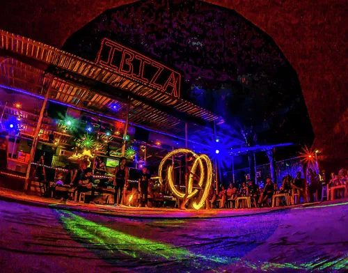 Image taken from https://images.fineartamerica.com/images/artworkimages/mediumlarge/1/1-thailand-koh-phi-phi-don-club-ibiza-fire-spinning-performers-ryan-kelehar.jpg