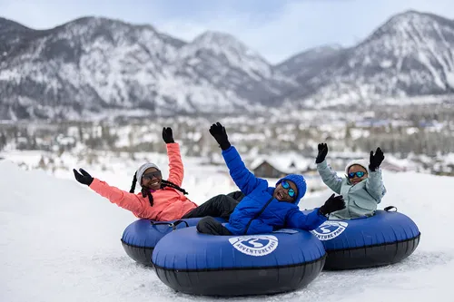 Image taken from https://www.townoffrisco.com/wp-content/uploads/2024/09/Family-in-Tubes-at-Tubing-Hill_Credit-Joe-Kusumoto_1280x853.jpg