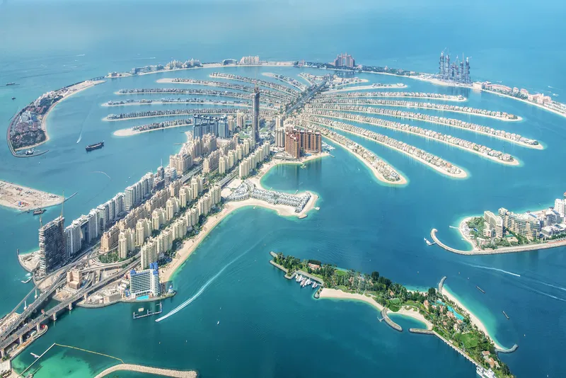 Image Taken from https://www.tripsavvy.com/thmb/2OJQu3bD40mxITL5dEreD3wsFWc=/4000x2670/filters:fill(auto,1)/aerial-view-of-dubai-palm-jumeirah-island--united-arab-emirates-1097789900-b6c44835cb3945f481427a612f2cdd0b.jpg