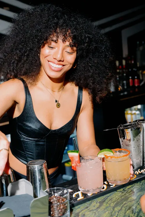 Image taken from https://zouk.la/wp-content/uploads/2025/06/bartender_serving_cocktails_zouk-scaled.jpg
