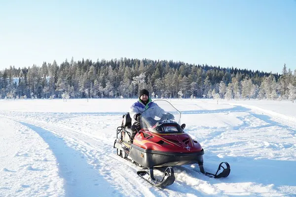 Sweden & Belize Snowmobile Adventure: Northern Lights & Winter Thrills!