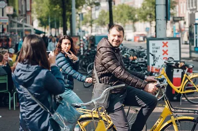 Amsterdam's Iconic Yellow Bike Adventure: Cycle Through History!