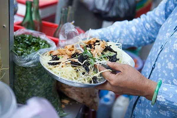 Ho Chi Minh City Street Food Adventure: Big Eats, Small Seats!