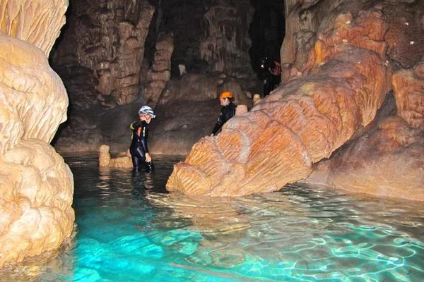 Cala Romantica Cave Adventure: Hike, Abseil, Swim!
