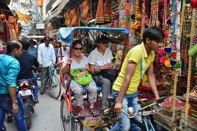 Unveiling Old Delhi: A Rickshaw Ride Through History & Flavors
