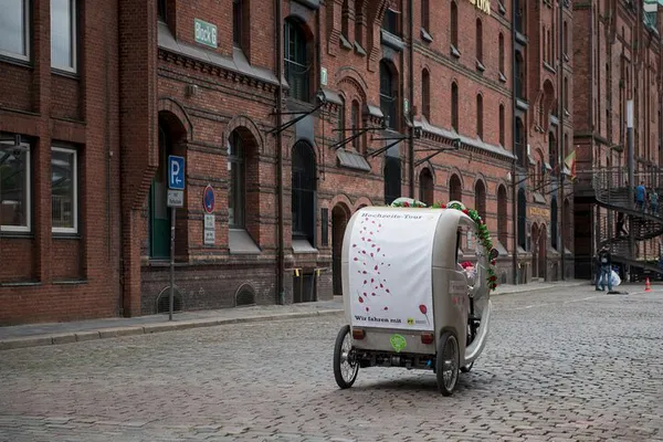 Glide Through Hamburg: A Romantic Rickshaw Adventure for Two