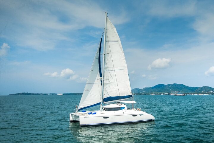 Phuket's Catamaran Sunset Voyage: Coral Island Adventure Awaits!