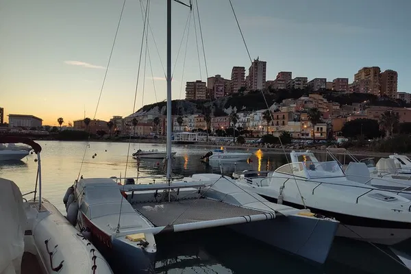 Sail to Scala dei Turchi: Catamaran Adventure with Snorkeling & SUP