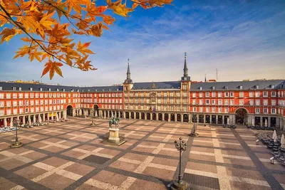 Uncover Madrid's Royal Secrets: A Palace & Plaza Walking Adventure