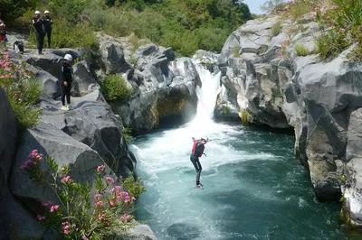 TuffAlcantara River Adventure: Dive, Slide, and Conquer!