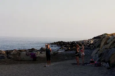 Sunrise Serenity: Beach Yoga Bliss in Italy & Belize