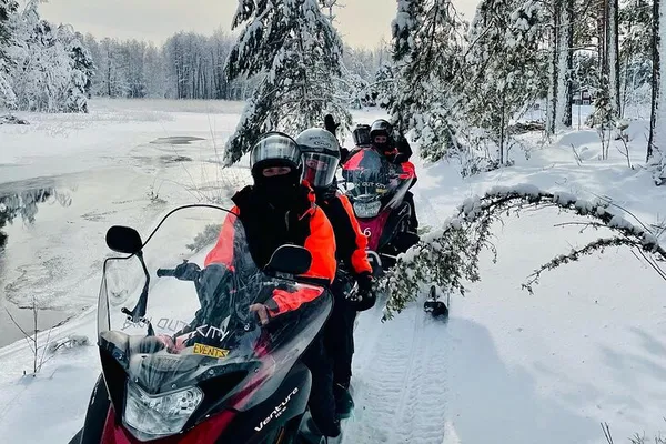 Helsinki Adventure: Snowmobile Tour & Glass Igloo Escape!