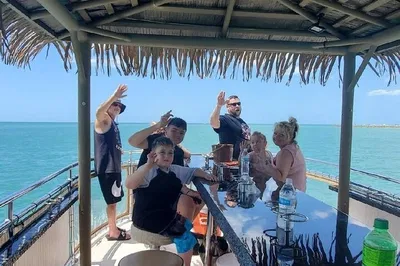 Clearwater's Floating Tiki Bar: Unlimited Drinks & Harbor Views!