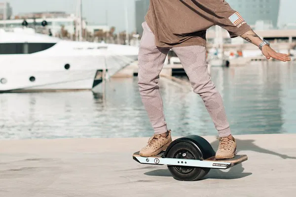 Glide Through Barcelona: Onewheel Adventure by the Olympic Port!