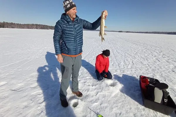 Arctic Thrills: Ice Fishing Adventure on Lake Bodom with Helsinki Tour!