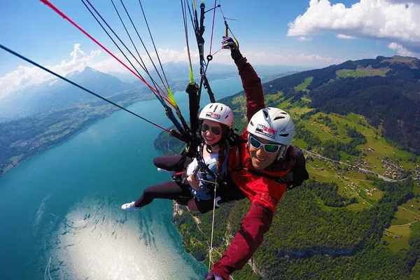 Interlaken Adventure: Paraglide Over Swiss Alps & Explore Charm