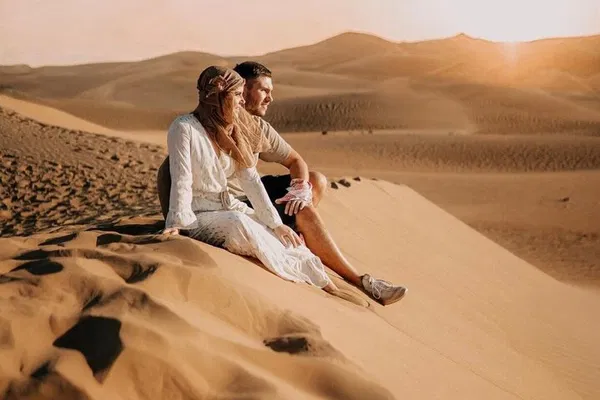 Desert Safari: BBQ, Camel Ride & Sandboarding Adventure