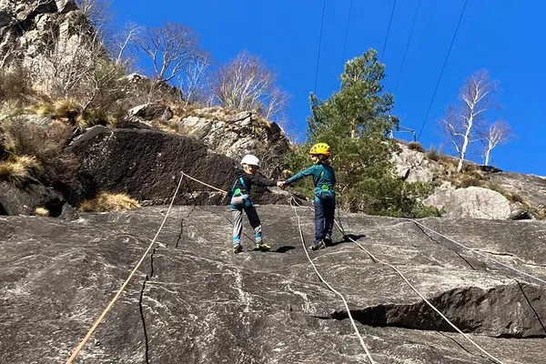 Conquer Swiss Cliffs: Family Rock Climbing Adventure near Locarno!