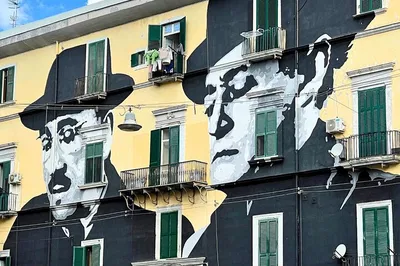 Unveiling Naples' Soul: Murals, Catacombs & Folklore Tour