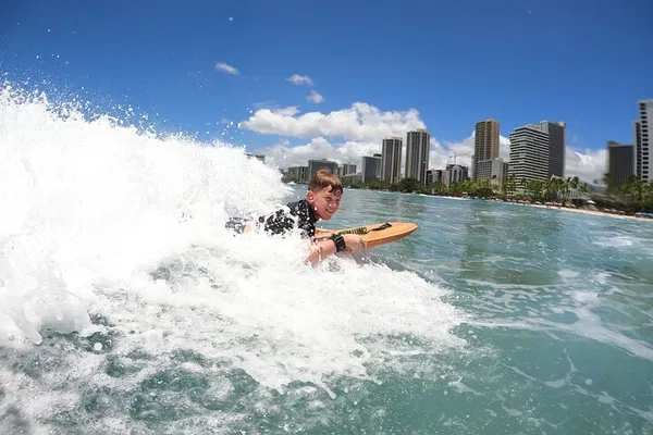 Waikiki Waves: Ride the Surf with Expert Guidance & Shuttle Convenience!