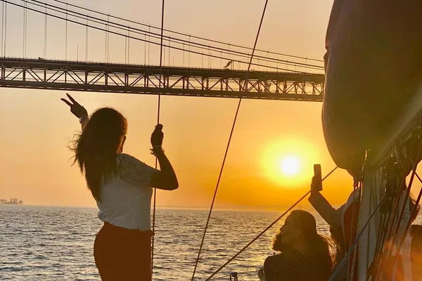 Lisbon Sunset Cruise: Sail, Drink, & Discover!