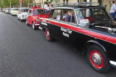Madrid's Vintage Charm: Taxi Tour 1500 Adventure