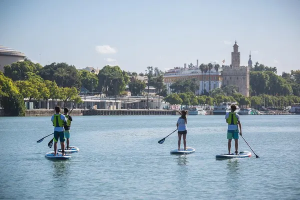 Glide into Seville's Heart: Paddle Surf Adventure!