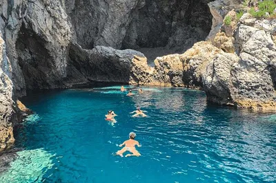 Taormina Luxury Boat Tour: Coast, Caves & Aperitif