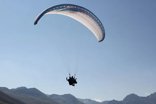 Soar Through Swiss Skies: Davos Paragliding Tandem Flight
