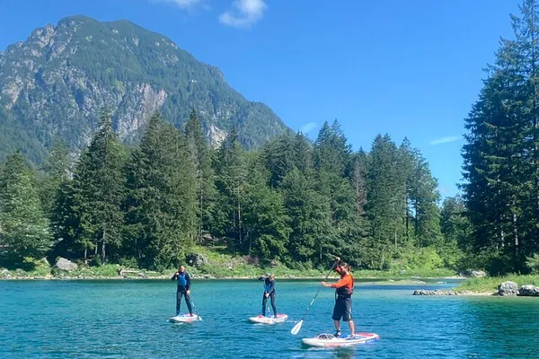 Glide on Lake Predil: SUP Adventure with Mountain Views!