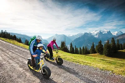 Thrilling Swiss Alps: Monster Scooter Adventure & Fondue Delight!