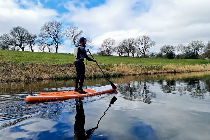 Glide & Discover: Paddle Boarding Adventures on Derwent Water