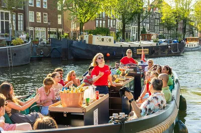 Amsterdam Canal Cruise: Guided Open Boat Tour + Drink