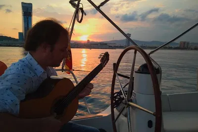 Barcelona Sunset Sailing: Spanish Guitar, Tapas & Mediterranean Magic!