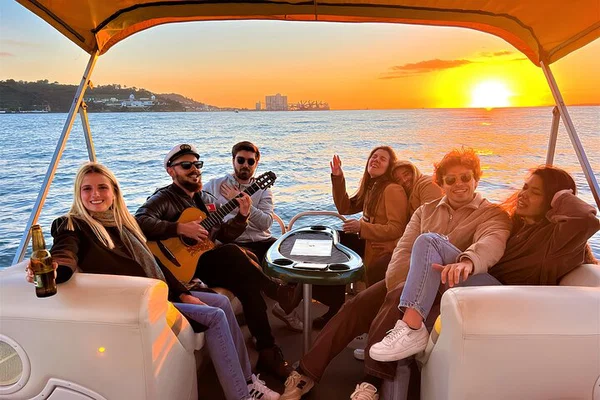 Lisbon Sunset Cruise: Wine, Music & River Views!