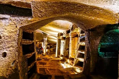 Unearth Rome's Secrets: Catacombs Tour with Private Transfer
