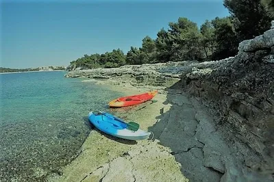 Paddle Pula's Azure Waters: Kayak Adventures Await!