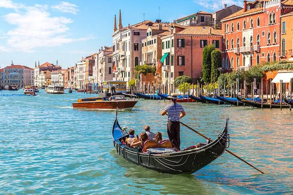 Venice's Charm: Walking Tour & Gondola Ride Through History