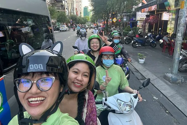 Unveiling Saigon's Soul: A Scooter Street Food Adventure with Optional Ao Dai Rider