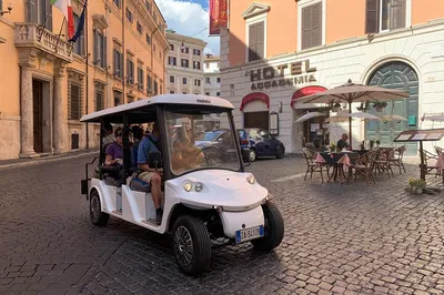 Glide Through Ancient Wonders: Rome Golf Cart Tour with Aperitivo