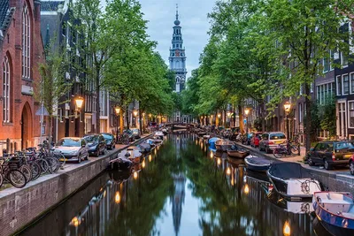 Stress-Free Bruges to Amsterdam Transfer: Sightseeing Included!