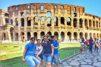 Step Back in Time: Colosseum & Roman Forum Tour with Ancient Theater Lunch
