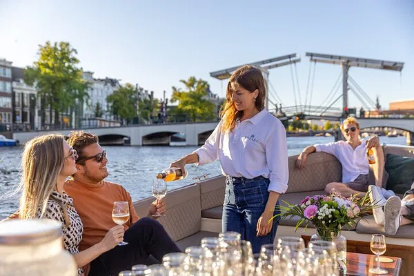Amsterdam Canal Cruise: Uncover History with Drinks & Snacks!