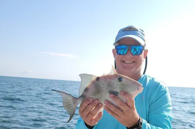 Reel in the Fun: Small-Group Fishing Charters in Belleair Bluffs!
