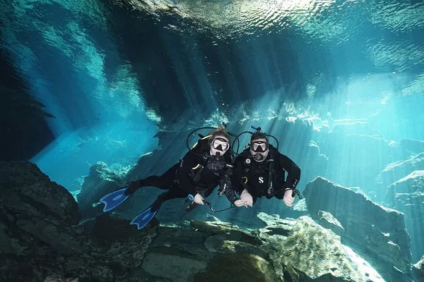 Dive into Mayan Mystique: Cenote Kukulkan Scuba Adventure!