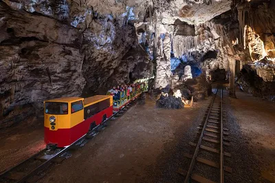 Journey to the Subterranean Marvels: Postojna Cave & Predjama Castle Day Trip